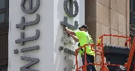 Twitter removed half its HQ sign — then the police arrived