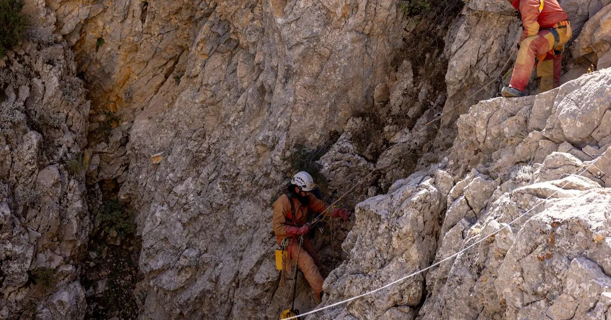 US caver who became trapped 1,000 metres deep in Turkey is moved halfway to surface