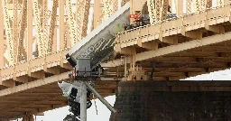 ‘I Have You’: Firefighter Rescues Driver From Truck Dangling Off Bridge