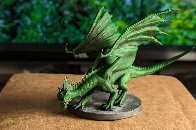 The latest mini I painted, a Young Green Dragon