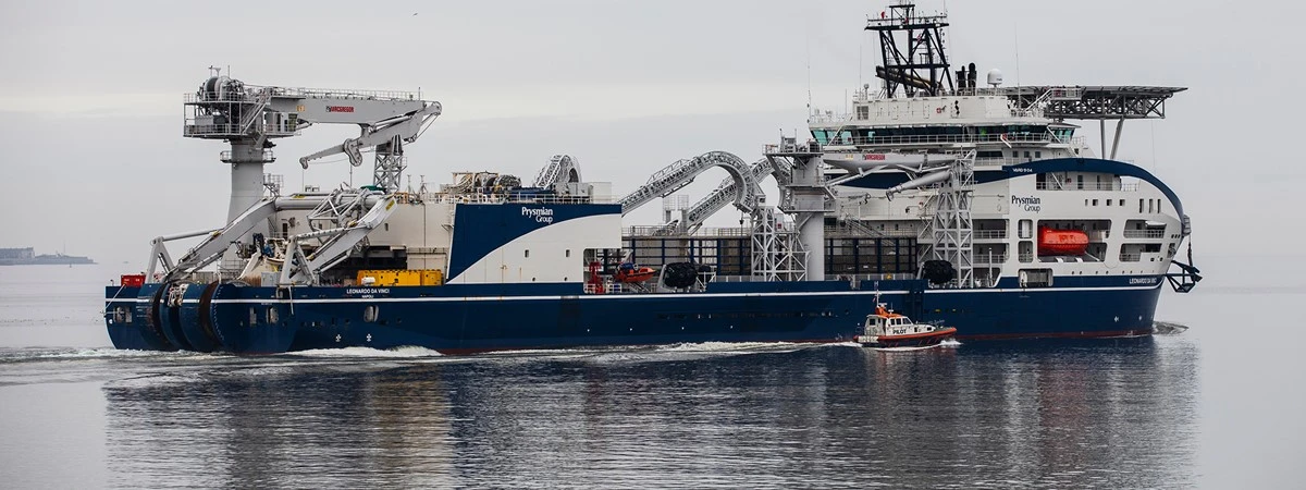 Ship begins laying 440km cable to link world’s largest offshore wind farm to UK energy grid