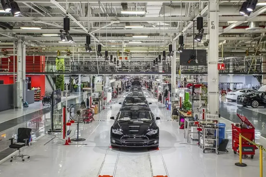 Elon Musk says Tesla workers will be sleeping on the factory floor when new $25,000 EV goes into production next year