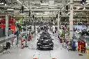 Elon Musk says Tesla workers will be sleeping on the factory floor when new $25,000 EV goes into production next year