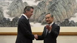 Senior Chinese leaders greet California Gov. Newsom with warm words in a rare cordial display