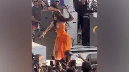 A concertgoer threw a drink at Cardi B while she was performing on stage, so she fought back | CNN