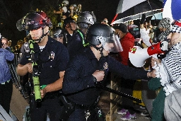 Police shoot at UCLA protesters as encampment cleared