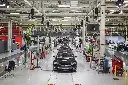 Elon Musk says Tesla workers will be sleeping on the factory floor when new $25,000 EV goes into production next year