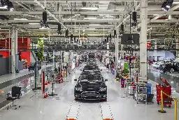 Elon Musk says Tesla workers will be sleeping on the factory floor when new $25,000 EV goes into production next year