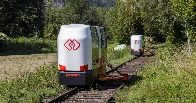 Self-balancing commuter pods ride old railway lines on demand