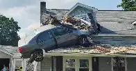 Car crashes into second floor of Pennsylvania house