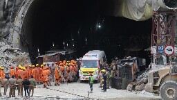 Rescuers begin pulling out 41 workers trapped in a collapsed tunnel in India for 17 days