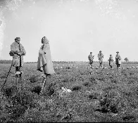 Shepards on stilts to help traverse marshy ground, Gascony, France, ~1895