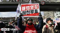 Attempt to arrest S Korea president suspended after dramatic standoff