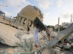 Photos: Israeli strikes flatten buildings, mosques in Gaza