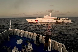 China raises stakes in disputed waters