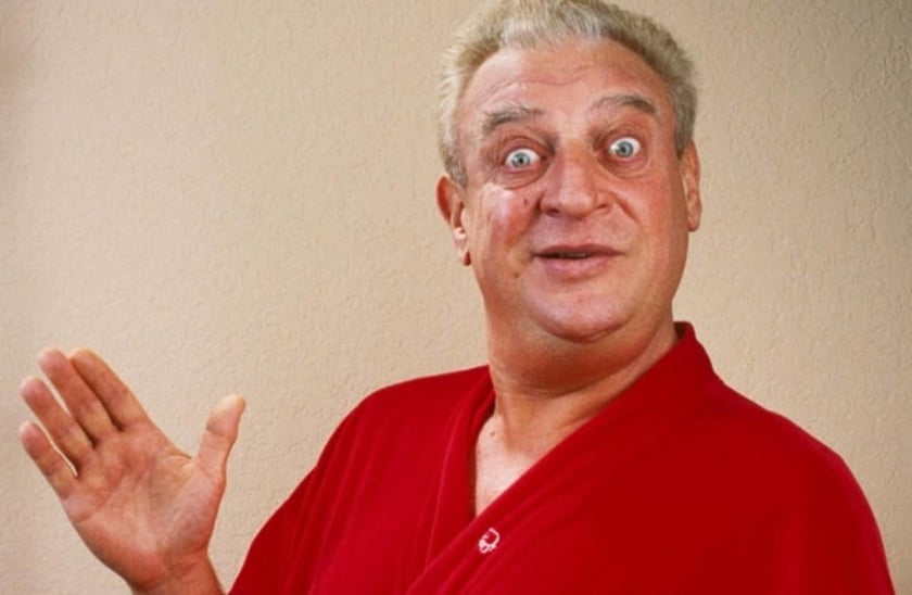 Comedian Rodney Dangerfield giving his trademark facial expression.