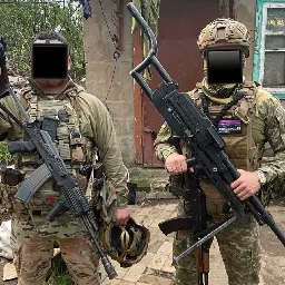 PKT vehicle-mounted machine gun of a Ukrainian soldier modified into a bullpup version. - Sopuli