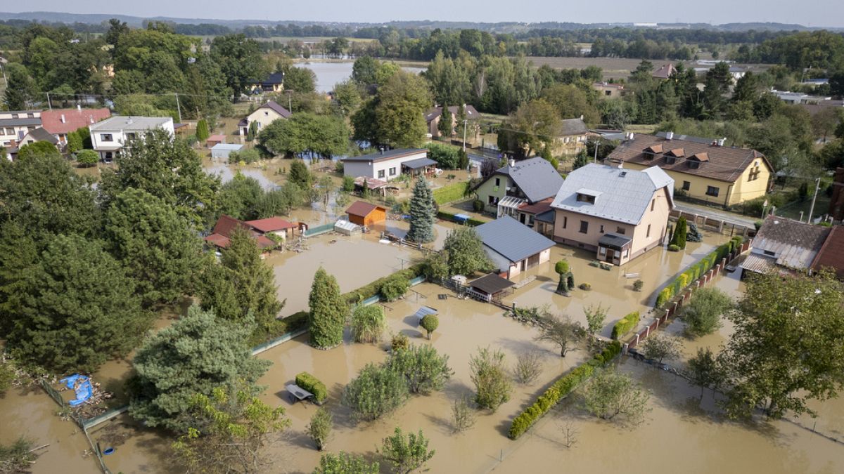 Austrians struck by flooding reel from ruin left in its wake