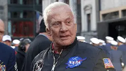 The Weird Reason Buzz Aldrin Wears Three Watches On His Arms