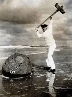 Dutch sailor 'displaying' the Belgian method (not an actual method) of disposing of sea mines, 1939/1940?