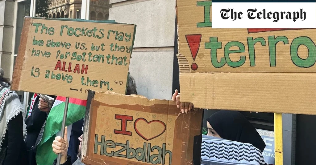 Protesters march through London with ‘I love Hezbollah’ banners