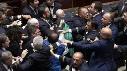 Italy’s parliament erupts into violence over government bill