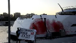 Activists spray red paint over billionaire Walmart heiress's superyacht for a second time | CNN