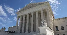 Under fire, US Supreme Court unveils ethics code for justices