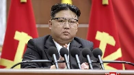 North Korea’s Kim vows to launch 3 more spy satellites and produce more nuclear materials in 2024