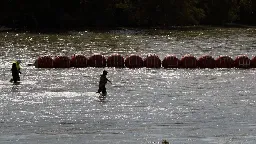 Justice Department planning legal action against Texas over floating border barrier | CNN Politics