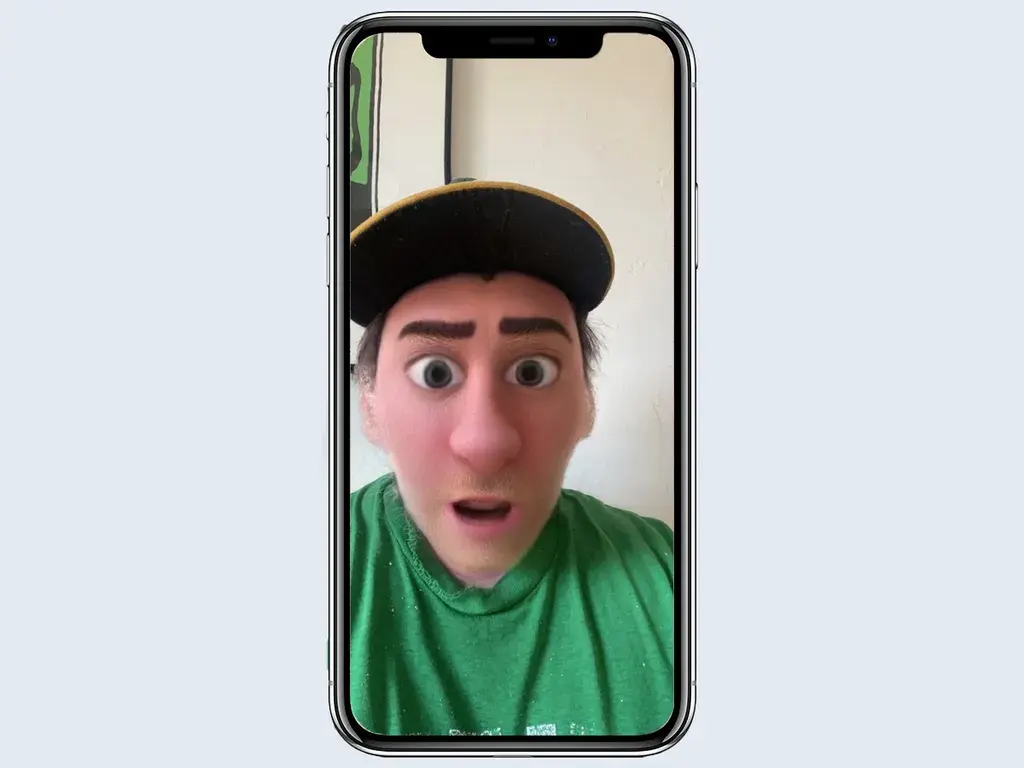 photo of the Snapchat filter cartoon 3D style showing someone in a hat and a green shirt with cartoon eyes