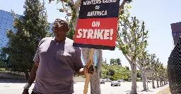Striking writers and actors throw shade over tree trimming at Universal picket line