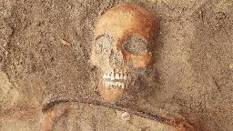 Child's skeleton found padlocked to 17th century grave in Poland to 'stop vampire rising from the dead'