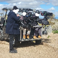 Steadicam and ZeeGee mounted to the back of a Gator