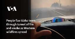 People flee Idaho town through tunnel of fire and smoke as Western wildfires spread