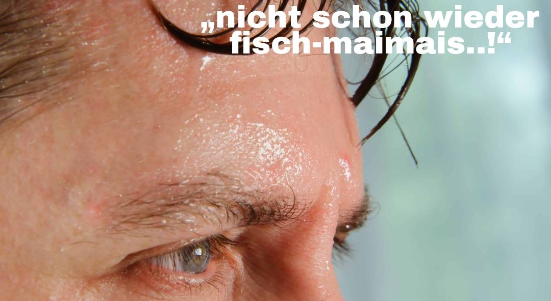 Mann mit Schweißperlen im Gesicht, "nicht schon wieder fisch-maimais"