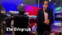 Armed men invade live TV broadcast in Ecuador