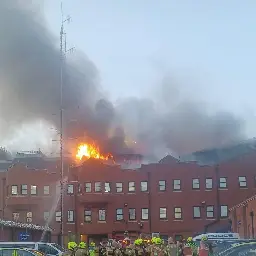 Firefighters battle blaze at Forest Gate police station