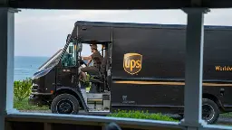 UPS announces 12,000 job cuts, says package volume slipped last quarter