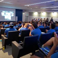 BYU football players mentor students in BYU-Pathway Worldwide