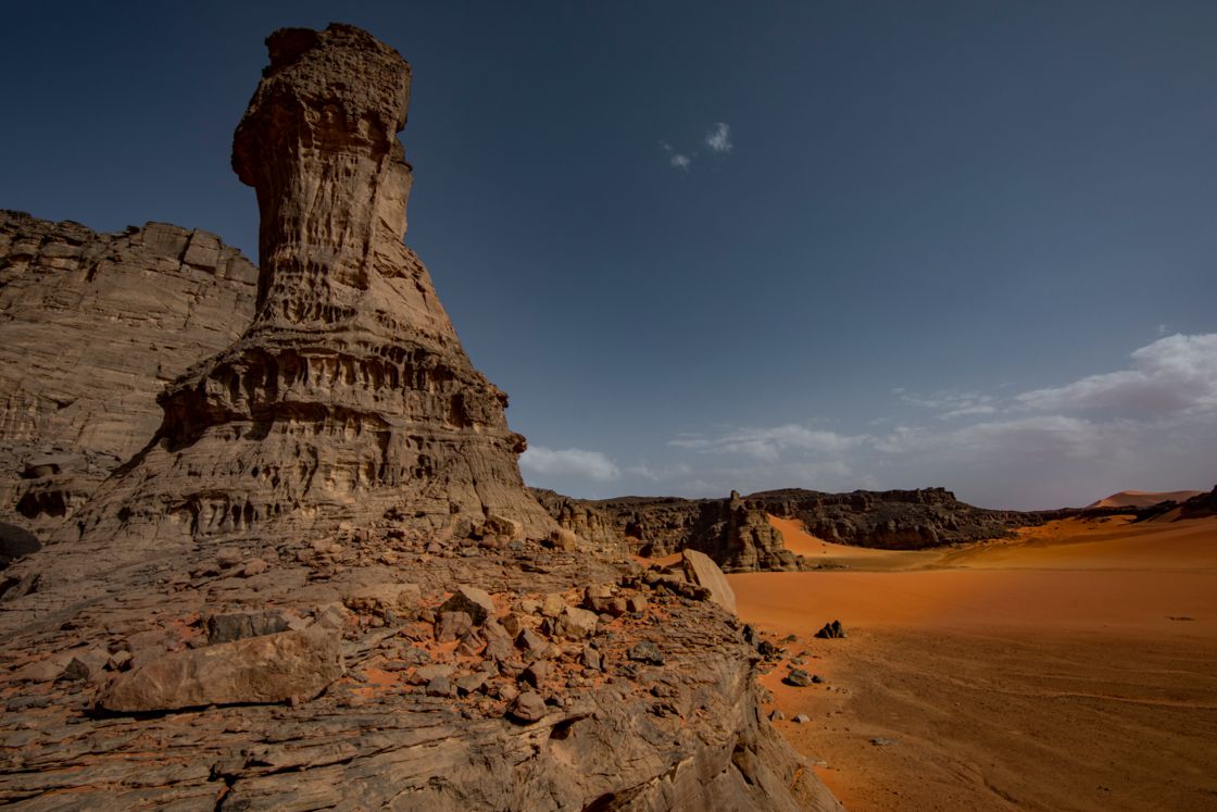 Image: Tassili n'Ajjer. Athas is so devastated, that it's often hard to tell, whether the thing on the horizon is a natural rock formation, or a tower of an ancient mage, now abandoned and eroded.