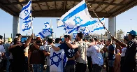 Israeli protesters storm military bases after soldiers detained for alleged abuse of Palestinian prisoners