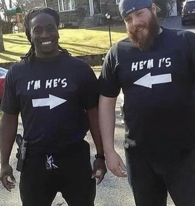 Couple wearing shirts that say "I'm he's" and "he'm I's"