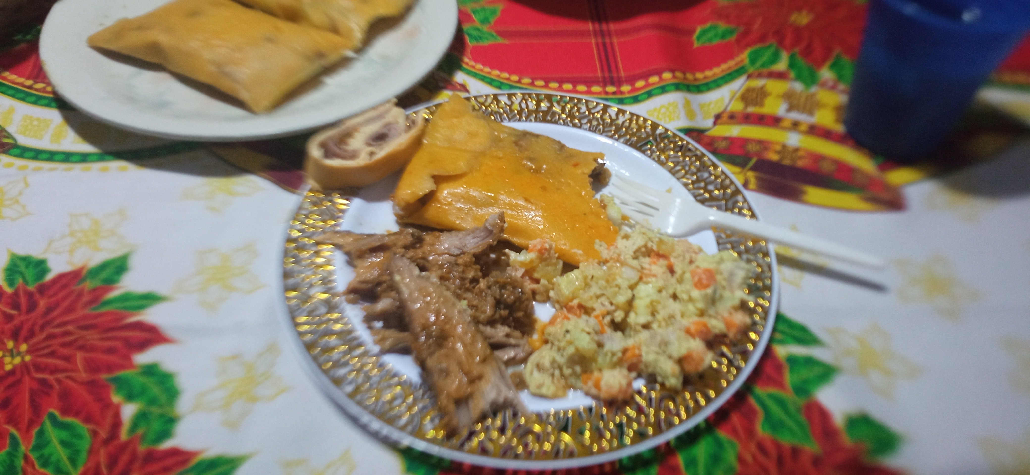 Venezuelan dish with Hallacas, Ham Bread, Pig Leg and Chicken Salad