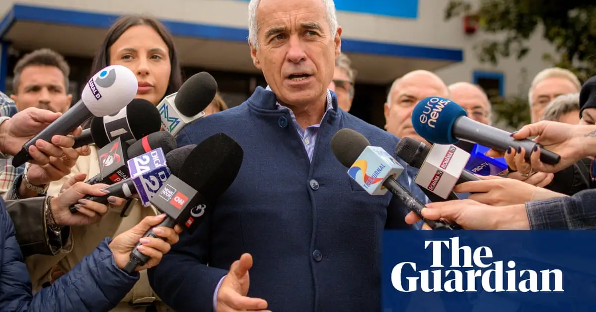 Shock in Romania as hard-right Nato critic Calin Georgescu takes lead in presidential election