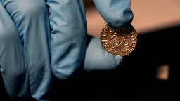 Hoard of 1,000-year-old coins unearthed in a farmer's field sells for $5.6 million