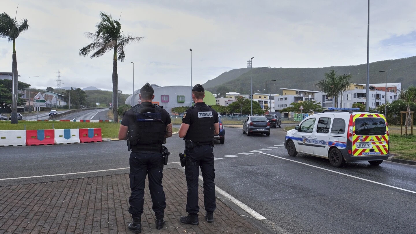 French president is considering imposing a state of emergency in the territory of New Caledonia