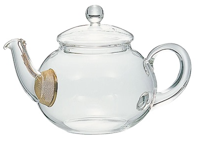 Hario Glass Jumping Teapot. A medium sized round glass teapot with golden metal mesh filter inside the pot in the spout