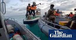 Philippines accuses Chinese coastguards of piracy after violent confrontation