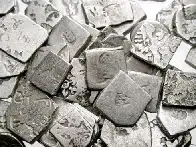 Part of a hoard of square Mauryan silver coins from India, 3rd century BCE